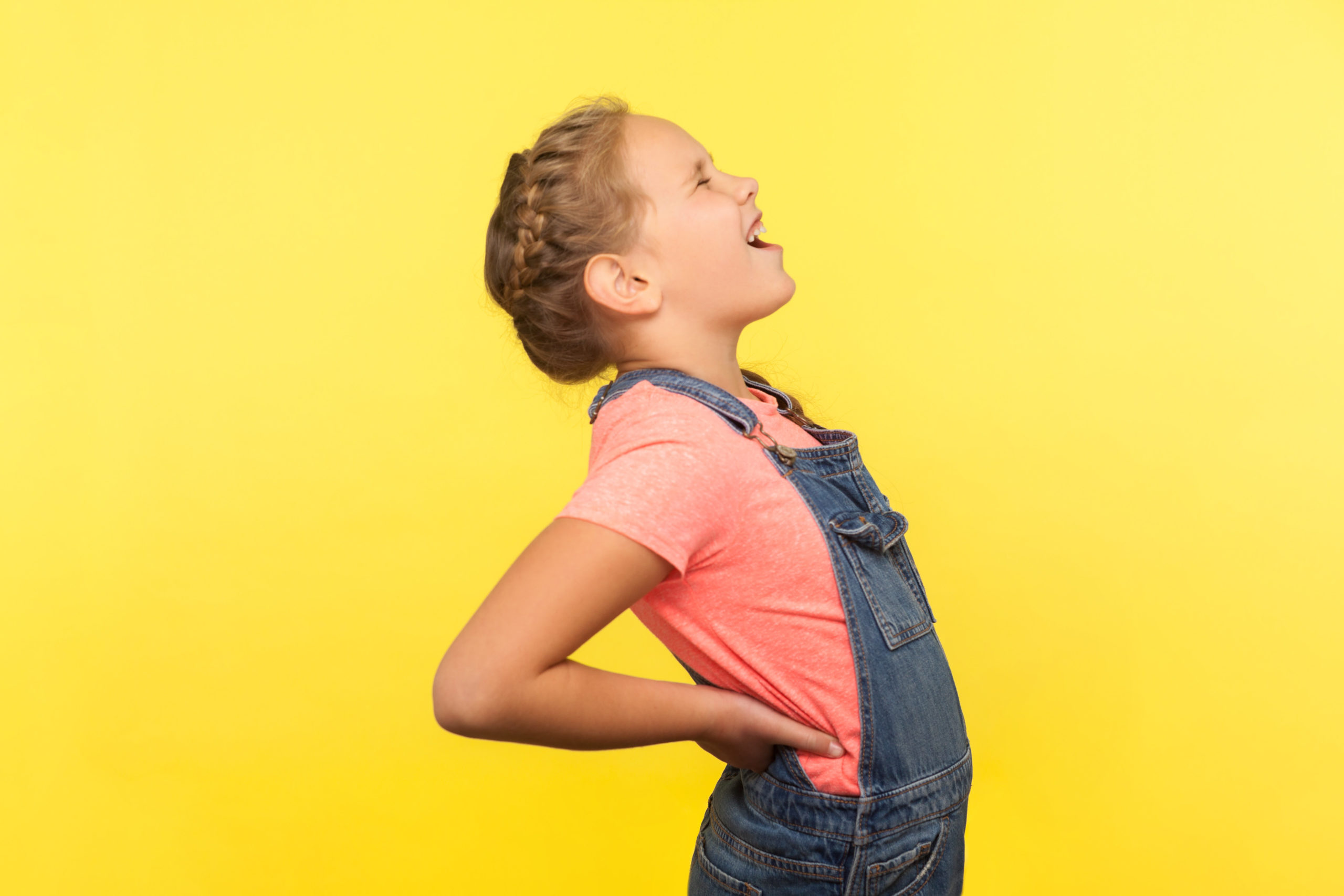 young girl with a sore back